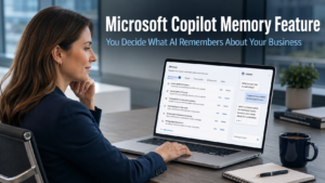 Business professional reviewing the Microsoft Copilot memory management settings on a laptop in a modern office, representing the new Microsoft Copilot memory feature giving users control over what AI retains